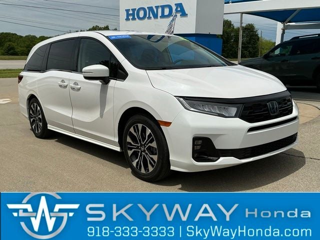 2025 Honda Odyssey Elite in Platinum White Pearl — front three-quarter view