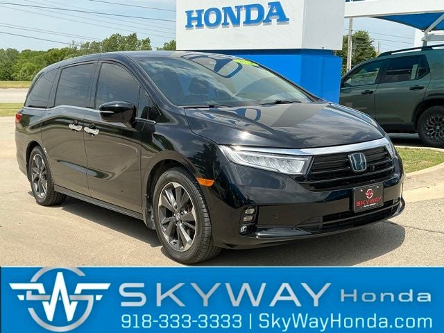 2024 Honda Odyssey Elite in Crystal Black Pearl — front three-quarter view