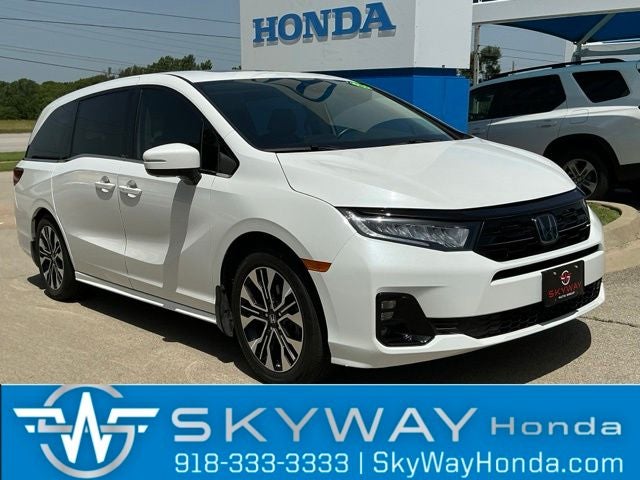 2025 Honda Odyssey Elite in Platinum White Pearl — front three-quarter view