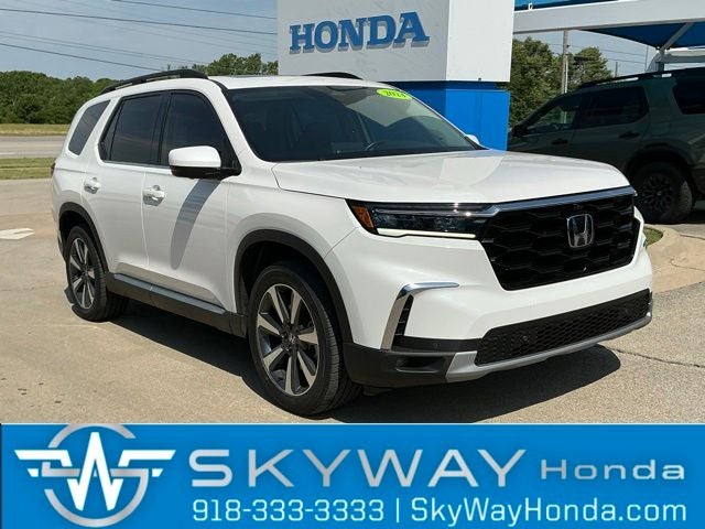2024 Honda Pilot Elite in Platinum White Pearl — front three-quarter view