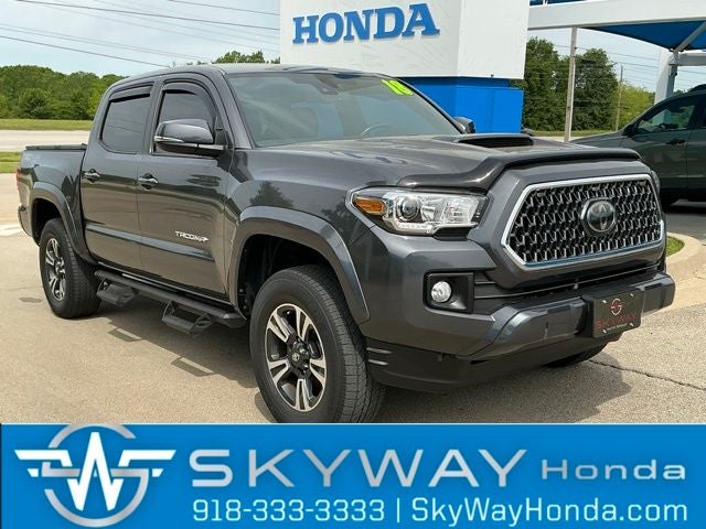 2018 Toyota Tacoma TRD Sport V6 in Magnetic Gray Metallic — front three-quarter view